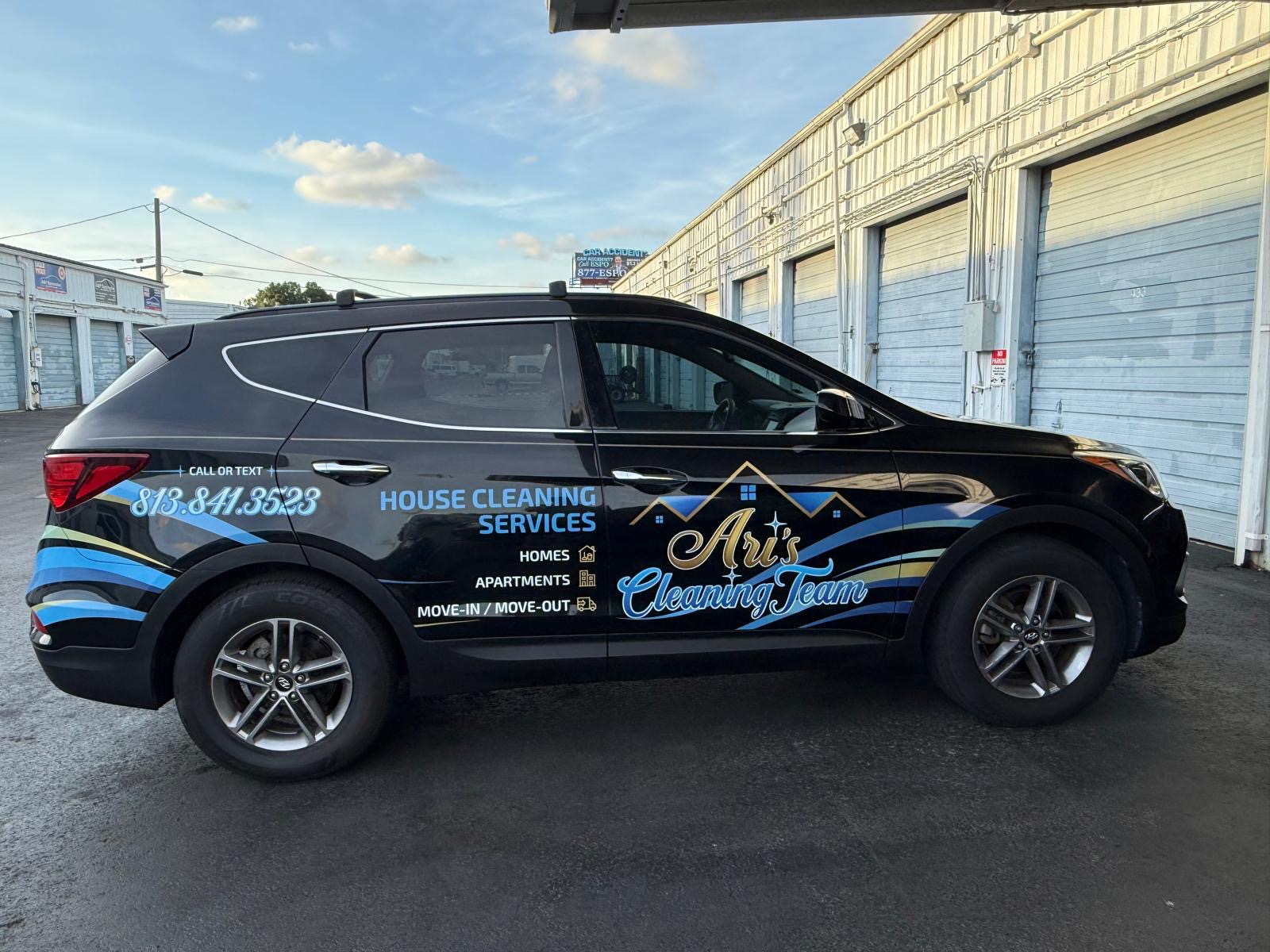 Ari's Cleaning Team branded service vehicle
